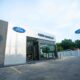 Exterior view of the newly opened Ford Mandaue dealership in Cebu, featuring a modern building facade with Ford signage and a spacious parking area.