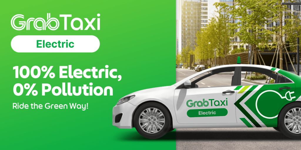 A promotional image for GrabTaxi Electric featuring a white and green electric taxi with eco-themed graphics, parked along a tree-lined urban road. The left side of the image has bold text reading “100% Electric, 0% Pollution – Ride the Green Way!” with GrabTaxi’s logo and the word “Electric” prominently displayed.