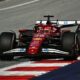Ferrari Formula 1 driver Charles Leclerc powers through a corner at the Red Bull Ring during the 2025 Austrian Grand Prix, with his red SF-24 car riding the curb under bright track conditions.