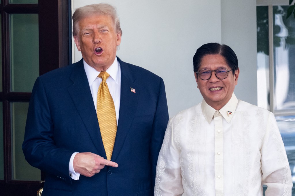 Former US President Donald Trump and Philippine President Ferdinand Marcos Jr. pose together outside the White House following bilateral trade talks.