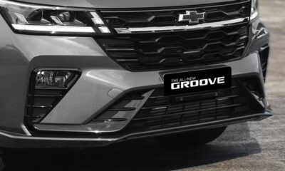 Front close-up of the Chevrolet Groove RS showing its LED headlamps, gloss black grille, and carbon fiber-style front skirt