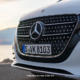 Close-up of the Mercedes-Benz V-Class Elegance grille and front bumper at sunset