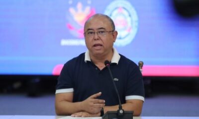 LTO official addresses the media during a press conference on replacement plate distribution.
