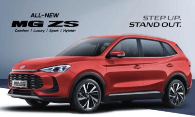Front-side view of the all-new MG ZS Hybrid+ in vibrant red, featuring a large grille, LED headlights, and bold styling.