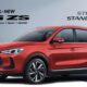 Front-side view of the all-new MG ZS Hybrid+ in vibrant red, featuring a large grille, LED headlights, and bold styling.
