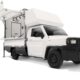 Side view of a white Toyota Tamaraw Mobile Store variant with its canopy doors open, revealing a compact interior fitted for mobile retail use.