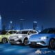 Four BYD electric vehicles—the Shark 6, Seagull, Atto 3, and Seal 5—parked in front of a futuristic city skyline at night, with Ayala Malls logos beneath them.