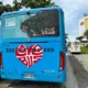 Back view of a blue Love Bus in Cebu with a heart-shaped logo and tourism branding.