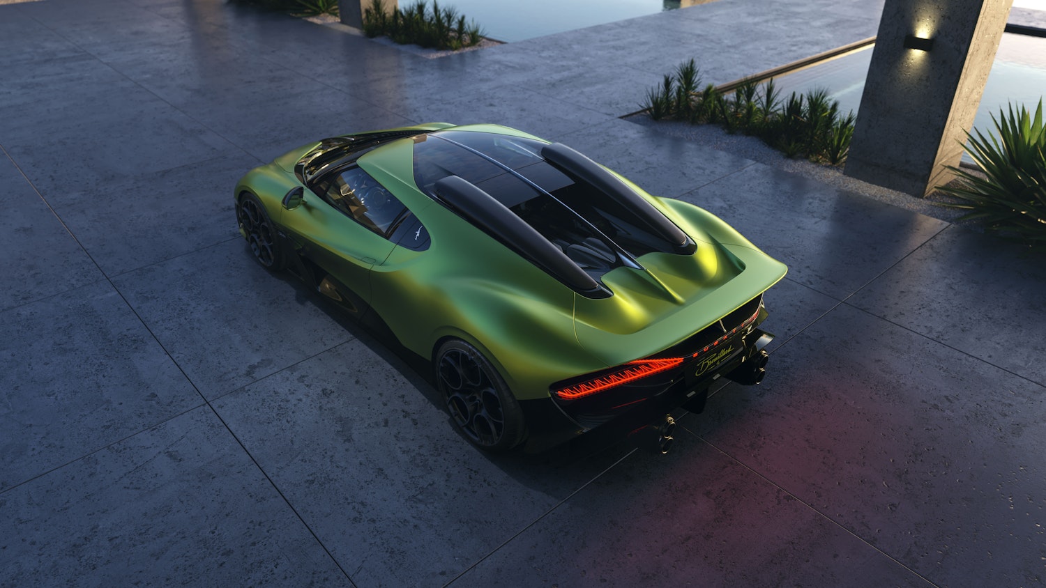 Rear three-quarter view of the Bugatti Brouillard in metallic green, parked by a modern concrete driveway beside a reflective water feature.