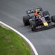 A Formula One car speeds through a corner at Zandvoort during Dutch Grand Prix weekend.