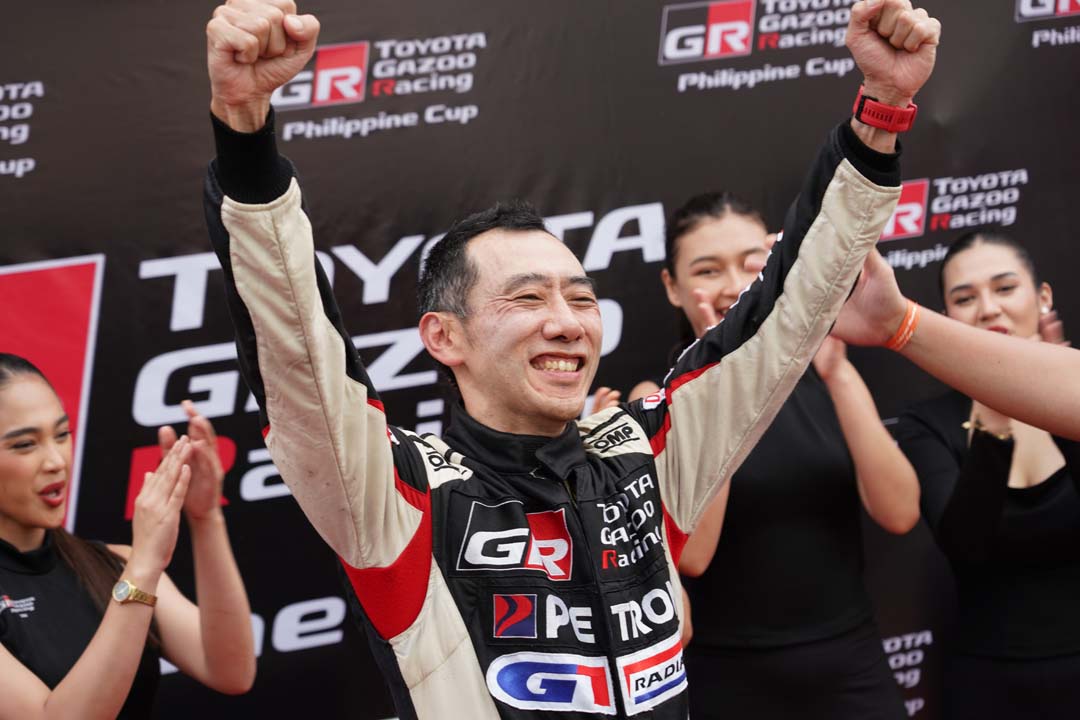 Toyota Motor Philippines President Masando Hashimoto celebrates with raised arms after winning the Endurance Race at the 2025 Toyota Gazoo Racing Philippine Cup.