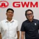 Two newly appointed executives of GWM Philippines, Jude Racadio (left) and Vincent Marquez (right), standing in front of the GWM logo during their official introduction.