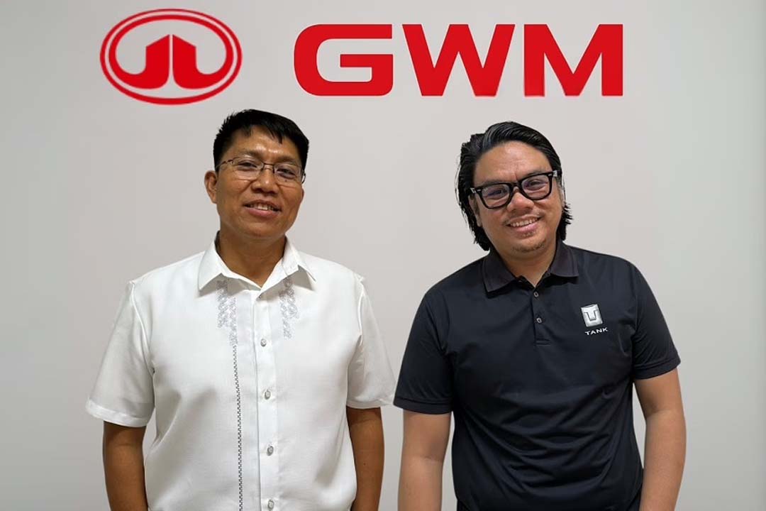 Two newly appointed executives of GWM Philippines, Jude Racadio (left) and Vincent Marquez (right), standing in front of the GWM logo during their official introduction.