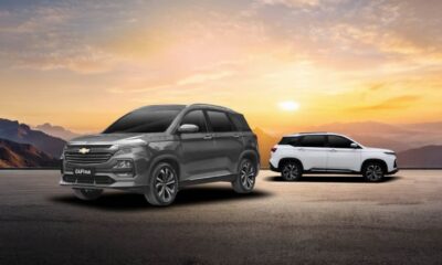 Two Chevrolet Captiva SUVs, one in black and one in white, displayed on a scenic mountain road at sunset with the text "Captivate Your Drive" and the BPI partner logo.