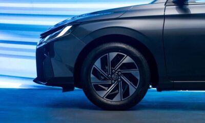 Front wheel and headlamp detail of the all-new Toyota ATIV under blue lighting